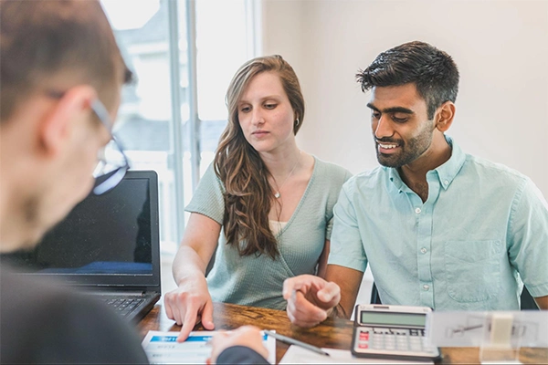Couple Consulting a Financial Advisor